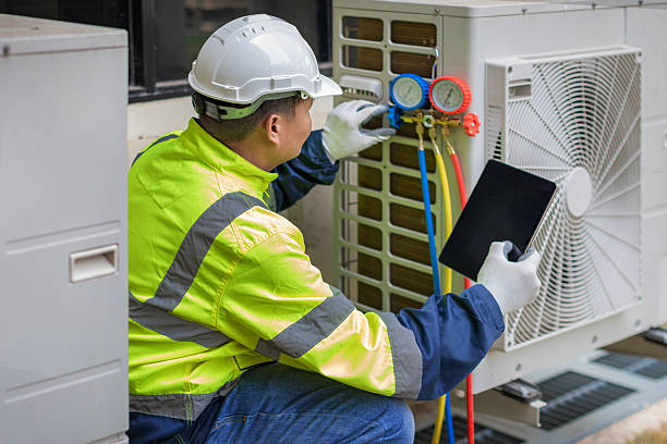Professional Ductwork Repair technician working in Ashville, OH